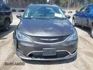 2017 Chrysler Pacifica Touring L with VIN 2C4RC1BGXHR667397, listed as a IAAI auction lot 42085117 with 63,996 mi miles and . Bid and sale history available at DreamBid. Image 18.