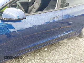 2023 Tesla Model 3 with VIN 5YJ3E1EA0PF518983, listed as a IAAI auction lot 41749225 with 26,748 mi miles and . Bid and sale history available at DreamBid. Image 12.