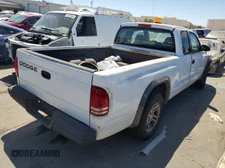 2002 Dodge Dakota with VIN 1B7GL12X92S701455, listed as a Copart auction lot 66929624 with 64,563 mi miles and Salvage Title. Bid and sale history available at carsss.com. Image 3.