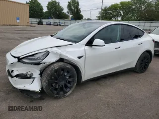 2021 Tesla Model Y Long Range z VIN 5YJYGAEE3MF188366, wystawiony jako Copart lot #57140205 z przebiegiem 92 659 mil mil oraz Szkoda całkowita • Salvage title. Historia ofert i sprzedaży dostępna na DreamBid. Obrazek 1.