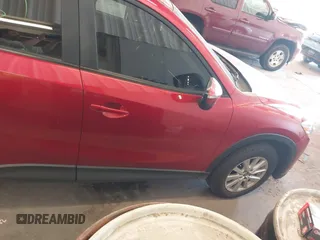 2016 Mazda CX-5 Sport z VIN JM3KE2BY3G0684861, wystawiony jako IAAI lot #42050897 z przebiegiem 165 688 mil mil oraz . Historia ofert i sprzedaży dostępna na DreamBid. Obrazek 14.
