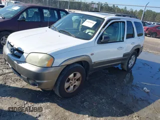 2004 Mazda Tribute ES with VIN 4F2CZ06164KM12579, listed as a IAAI auction lot 41654646 with 208,120 mi miles. Bid and sale history available at carsss.com. Image 2.