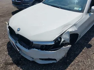 2018 BMW 5 Series 530i xDrive with VIN WBAJA7C50JG907628, listed as a IAAI auction lot 42646818 with 100,215 mi miles and . Bid and sale history available at DreamBid. Image 6.