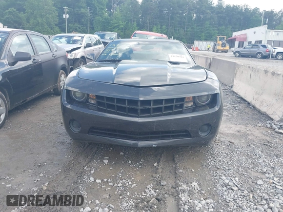 2013 Chevrolet Camaro LS z VIN 2G1FA1E39D9206888, wystawiony jako IAAI lot #42170703 z przebiegiem 169 661 mil mil oraz . Historia ofert i sprzedaży dostępna na DreamBid. Obrazek 13.