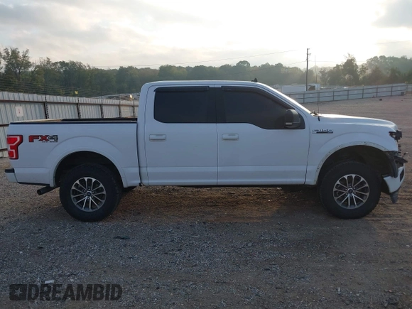 2019 Ford F-150 XL with VIN 1FTEW1E45KKE21872, listed as a IAAI auction lot 40704365 with 112,221 mi miles and . Bid and sale history available at DreamBid. Image 14.