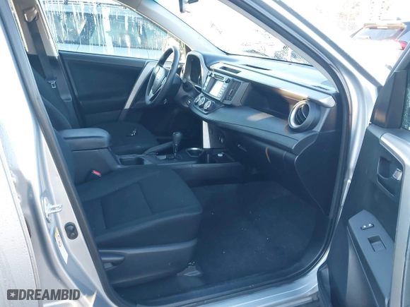 2016 Toyota RAV4 LE with VIN 2T3BFREV2GW477230, listed as a IAAI auction lot 41144507 with 82,425 mi miles. Bid and sale history available at carsss.com. Image 5.