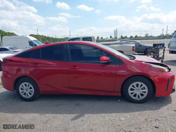 2021 Toyota Prius L Eco with VIN JTDKAMFU6M3148195, listed as a IAAI auction lot 41801369 with 130,601 mi miles. Bid and sale history available at carsss.com. Image 14.