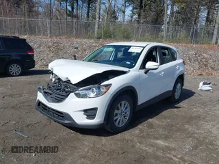 2016 Mazda CX-5 Sport with VIN JM3KE2BY9G0887110, listed as a IAAI auction lot 41761039 with 86,624 mi miles. Bid and sale history available at carsss.com. Image 2.
