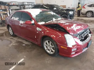 2008 Cadillac STS RWD z VIN 1G6DZ67A380197687, wystawiony jako IAAI lot #41613867 z przebiegiem Nie podano mil oraz . Historia ofert i sprzedaży dostępna na DreamBid. Obrazek 1.