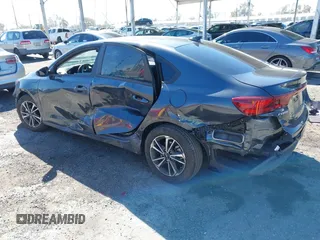 2023 Kia Forte LXS with VIN 3KPF24AD6PE648764, listed as a IAAI auction lot 41866394 with 26,341 mi miles and . Bid and sale history available at DreamBid. Image 3.