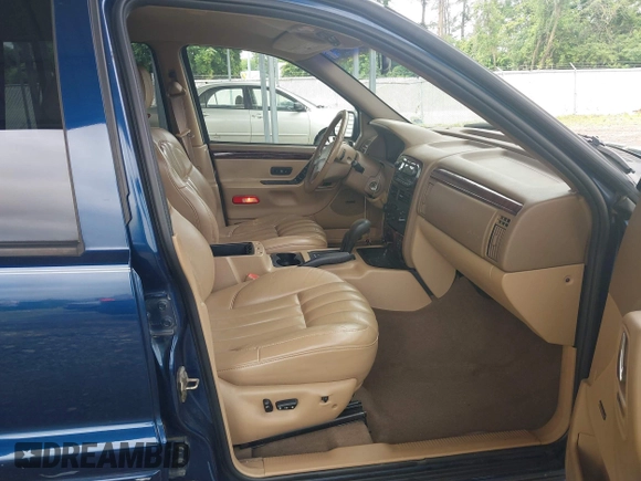 2000 Jeep Grand Cherokee Limited with VIN 1J4GW58S9YC347699, listed as a IAAI auction lot 42545373 with 118,566 mi miles and . Bid and sale history available at DreamBid. Image 5.