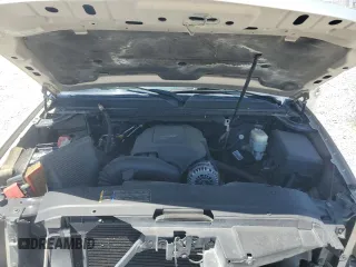 2007 Chevrolet Tahoe LTZ z VIN 1GNFK13057R201668, wystawiony jako Copart lot #58030125 z przebiegiem 197 818 mil mil oraz Szkoda całkowita • Salvage title. Historia ofert i sprzedaży dostępna na DreamBid. Obrazek 12.