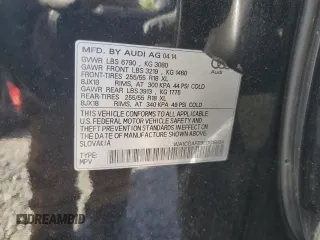 2014 Audi Q7 Premium with VIN WA1CGAFE9ED019934, listed as a Copart auction lot 56388595 with 104,549 mi miles and Salvage title. Bid and sale history available at DreamBid. Image 13.