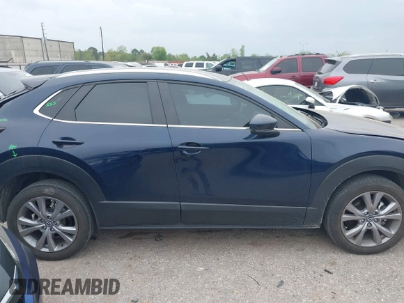 2023 Mazda CX-30 S Carbon Edition with VIN 3MVDMBCM1PM520066, listed as a IAAI auction lot 41877916 with 22,973 mi miles and . Bid and sale history available at carsss.com. Image 13.