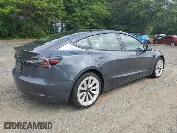 2022 Tesla Model 3 z VIN 5YJ3E1EA6NF185895, wystawiony jako Copart lot #60165405 z przebiegiem 190 572 mil mil oraz Czysty tytuł • Clean title. Historia ofert i sprzedaży dostępna na DreamBid. Obrazek 3.