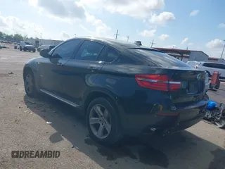 2014 BMW X6 xDrive35i with VIN 5UXFG2C5XE0C43526, listed as a IAAI auction lot 42121122 with 199,564 mi miles. Bid and sale history available at carsss.com. Image 3.