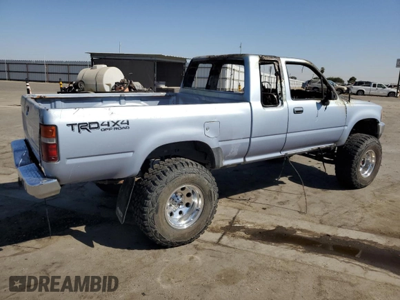 1991 Toyota Pickup DLX z VIN JT4VN13D7M5045456, wystawiony jako Copart lot #77028624 z przebiegiem Nie podano mil oraz Nie do naprawy • Non repairable. Historia ofert i sprzedaży dostępna na DreamBid. Obrazek 3.