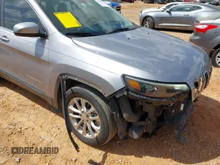 2019 Jeep Cherokee Latitude with VIN 1C4PJLCX7KD220799, listed as a IAAI auction lot 41970875 with 104,394 mi miles and . Bid and sale history available at DreamBid. Image 6.