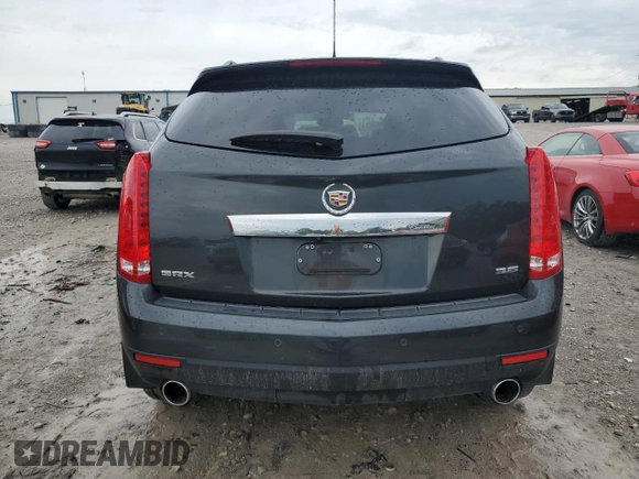 2016 Cadillac SRX Luxury Collection z VIN 3GYFNBE33GS527392, wystawiony jako Copart lot #54786465 z przebiegiem 58 327 mil mil oraz Czysty tytuł • Clean title. Historia ofert i sprzedaży dostępna na DreamBid. Obrazek 6.