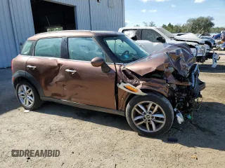 2013 MINI Countryman with VIN WMWZB3C5XDWM08130, listed as a Copart auction lot 45046245 with Not provided miles and Salvage title. Bid and sale history available at DreamBid. Image 4.
