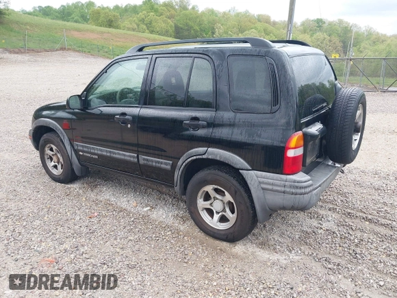2004 Chevrolet Tracker ZR2 with VIN 2CNBJ734646907924, listed as a IAAI auction lot 42088809 with 98,797 mi miles and . Bid and sale history available at DreamBid. Image 3.
