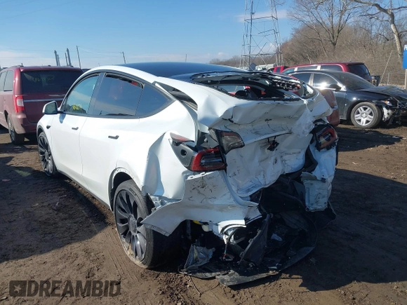 2024 Tesla Model Y Performance with VIN 7SAYGDEF3RA281969, listed as a IAAI auction lot 41680674 with 22,615 mi miles and . Bid and sale history available at DreamBid. Image 3.