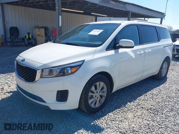 2016 Kia Sedona LX with VIN KNDMB5C10G6183002, listed as a IAAI auction lot 41629853 with 129,322 mi miles. Bid and sale history available at carsss.com. Image 2.