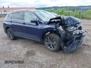 2022 Volkswagen Tiguan SE z VIN 3VV2B7AX2NM174360, wystawiony jako IAAI lot #42535724 z przebiegiem 34 723 mil mil oraz . Historia ofert i sprzedaży dostępna na DreamBid. Obrazek 1.