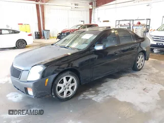 2003 Cadillac CTS with VIN 1G6DM57N630145426, listed as a IAAI auction lot 42141105 with 203,859 mi miles. Bid and sale history available at carsss.com. Image 2.