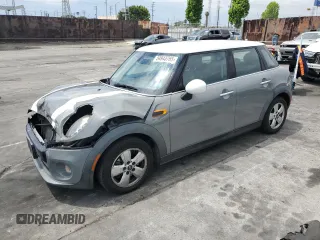 2015 MINI Hardtop 4 Door with VIN WMWXS5C56FT828846, listed as a Copart auction lot 54943765 with 78,964 mi miles and Salvage Title. Bid and sale history available at DreamBid. Image 1.