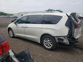 2021 Chrysler Pacifica Touring L with VIN 2C4RC1BGXMR559226, listed as a Copart auction lot 59515235 with 61,219 mi miles and Salvage title. Bid and sale history available at DreamBid. Image 2.