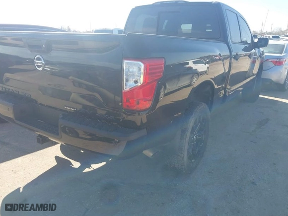 2018 Nissan Titan XD Platinum Reserve with VIN 1N6BA1F44JN522847, listed as a IAAI auction lot 41471499 with 119,124 mi miles. Bid and sale history available at carsss.com. Image 4.