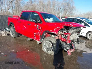 2022 Ram 1500 Rebel z VIN 1C6SRFLT8NN259683, wystawiony jako IAAI lot #41436136 z przebiegiem 24 100 mil mil oraz . Historia ofert i sprzedaży dostępna na DreamBid. Obrazek 1.