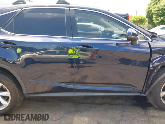 2016 Lexus RX 350 with VIN JTJBZMCA2G2001429, listed as a IAAI auction lot 42202436 with Not provided miles and . Bid and sale history available at DreamBid. Image 13.