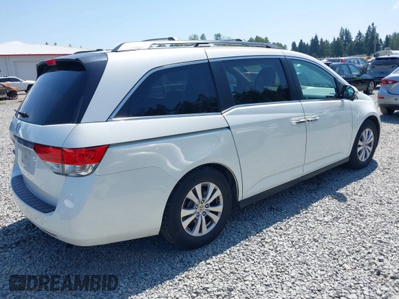 2014 Honda Odyssey EX-L z VIN 5FNRL5H69EB088589, wystawiony jako IAAI lot #42418952 z przebiegiem 96 767 mil mil oraz . Historia ofert i sprzedaży dostępna na DreamBid. Obrazek 4.