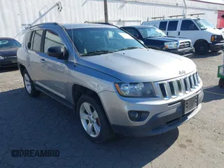 2016 Jeep Compass Sport with VIN 1C4NJCBA5GD574185, listed as a IAAI auction lot 42234955 with 127,468 mi miles and . Bid and sale history available at DreamBid. Image 1.