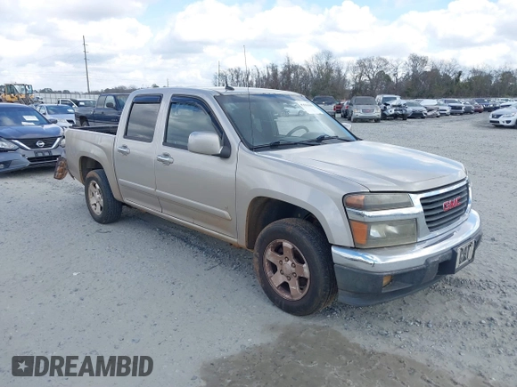 2009 GMC Canyon SLE1 with VIN 1GTCS139998131563, listed as a IAAI auction lot 41561682 with 211,603 mi miles. Bid and sale history available at carsss.com. Image 1.