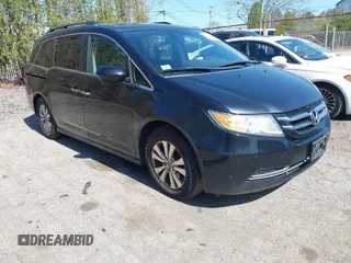 2014 Honda Odyssey EX-L with VIN 5FNRL5H68EB102286, listed as a IAAI auction lot 42148323 with 160,446 mi miles and . Bid and sale history available at carsss.com. Image 1.