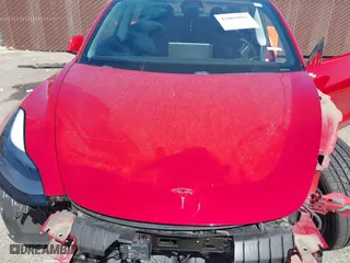 2021 Tesla Model 3 Long Range with VIN 5YJ3E1EBXMF928002, listed as a IAAI auction lot 42003092 with 25,867 mi miles. Bid and sale history available at carsss.com. Image 9.
