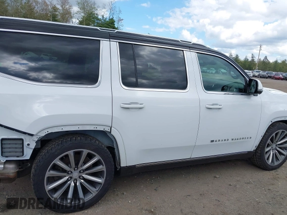 2022 Jeep Grand Wagoneer Series I with VIN 1C4SJVEJ4NS123980, listed as a IAAI auction lot 42232770 with 59,074 mi miles and . Bid and sale history available at DreamBid. Image 14.