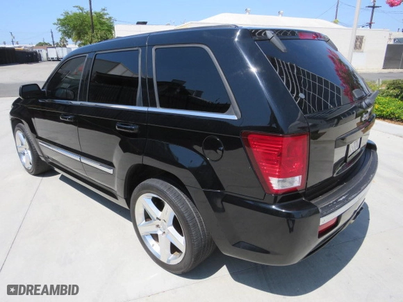 2007 Jeep Grand Cherokee SRT-8 with VIN 1J8HR78347C515195, listed as a Copart auction lot 77478044 with 126,330 mi miles and Salvage Title. Bid and sale history available at carsss.com. Image 4.