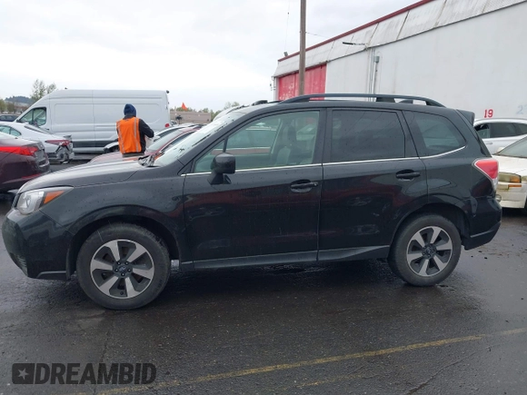 2018 Subaru Forester Premium with VIN JF2SJGEC4JH581718, listed as a IAAI auction lot 41988454 with 76,376 mi miles. Bid and sale history available at carsss.com. Image 14.