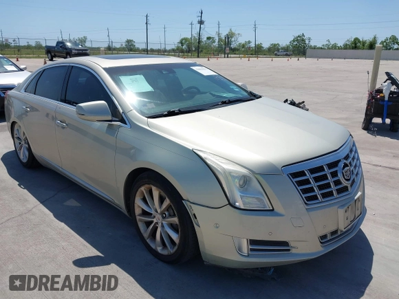 2014 Cadillac XTS Premium with VIN 2G61P5S33E9157607, listed as a IAAI auction lot 42004612 with 111,047 mi miles and . Bid and sale history available at DreamBid. Image 1.