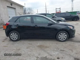 2021 Kia Rio S with VIN 3KPA25AD4ME417860, listed as a IAAI auction lot 41841053 with 58,530 mi miles and . Bid and sale history available at DreamBid. Image 13.