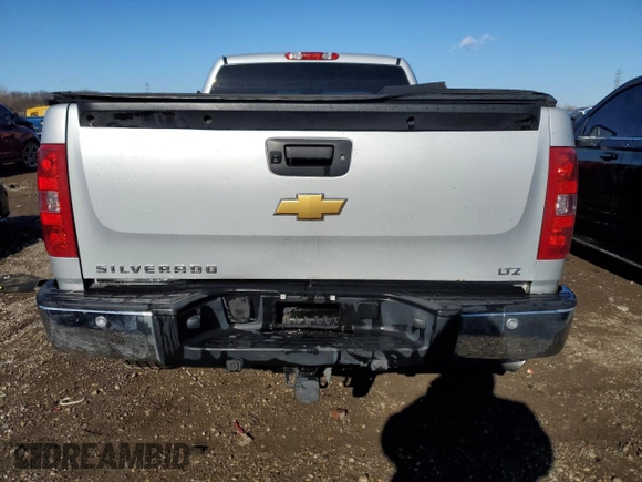 2013 Chevrolet Silverado 1500 LTZ with VIN 1GCRKTE77DZ225039, listed as a Copart auction lot 42239295 with 179,143 mi miles and Salvage Title. Bid and sale history available at DreamBid. Image 6.