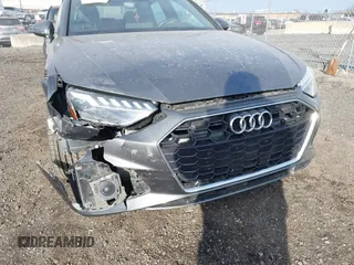2022 Audi A4 S line Premium Plus z VIN WAUEAAF41NN015360, wystawiony jako IAAI lot #41320262 z przebiegiem 63 275 mil mil oraz . Historia ofert i sprzedaży dostępna na DreamBid. Obrazek 17.