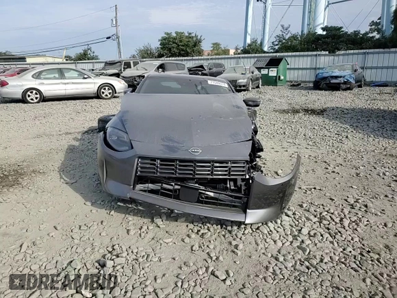 2024 Nissan Z Sport z VIN JN1BZ4AH7RM362538, wystawiony jako Copart lot #71589374 z przebiegiem Nie podano mil oraz Szkoda całkowita • Salvage title. Historia ofert i sprzedaży dostępna na DreamBid. Obrazek 11.