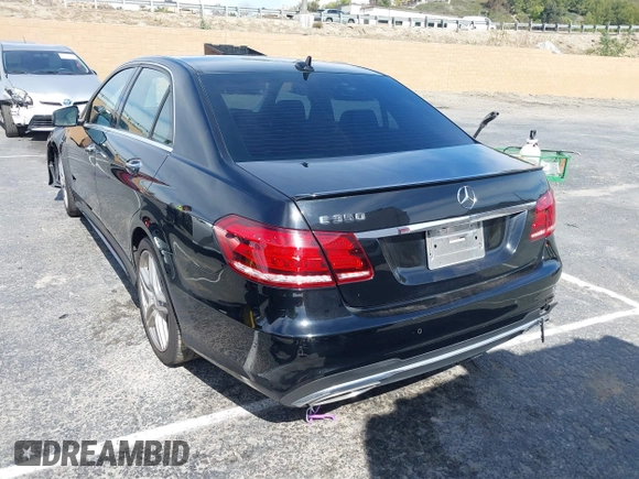 2014 Mercedes-Benz E 350 Sport with VIN WDDHF5KBXEA889555, listed as a IAAI auction lot 41589052 with 148,422 mi miles and . Bid and sale history available at DreamBid. Image 3.