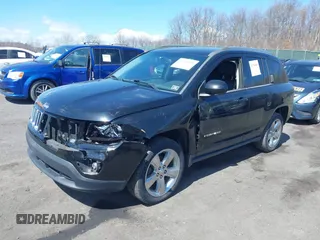 2014 Jeep Compass Limited with VIN 1C4NJDCBXED706173, listed as a IAAI auction lot 41784040 with 144,368 mi miles. Bid and sale history available at carsss.com. Image 2.