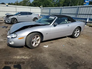 2002 Jaguar XK with VIN SAJDA42C32NA24106, listed as a Copart auction lot 67081604 with 79,976 mi miles and Salvage Title. Bid and sale history available at DreamBid. Image 1.